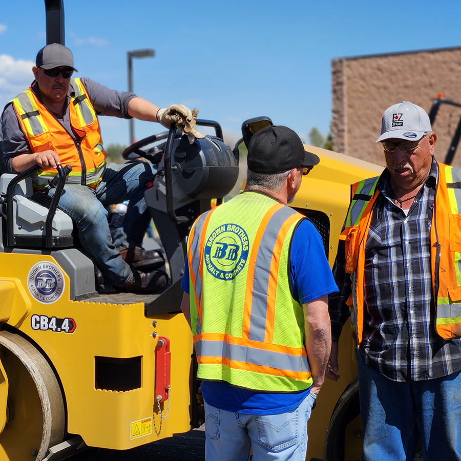 Brown Brothers Employees at work site talking
